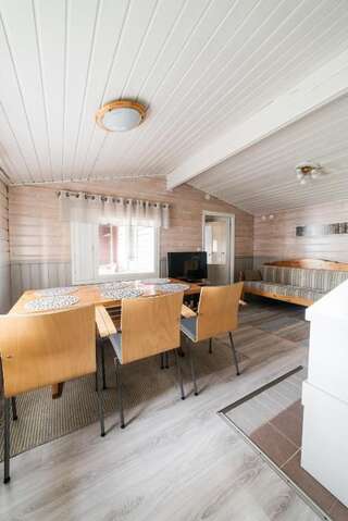 Дома для отпуска Jokiniemen Matkailu Cottages Tölvä Коттедж с 3 спальнями и сауной - А-35