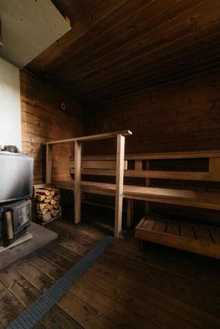 Дома для отпуска Jokiniemen Matkailu Cottages Tölvä Коттедж с 3 спальнями и сауной - А-39